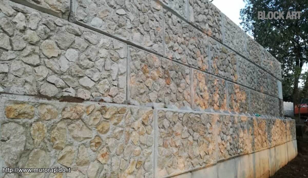 Muro di contenimento con rivestimento in pietra
